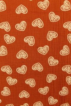 Scratched hearts on Rusty